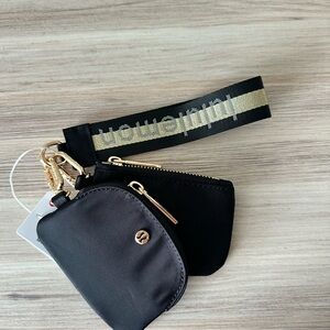 Lululemon Black Dual Pouch wristlet with Gold details